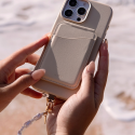 Case UNIQ Coehl Perla Handstrap universal sznurek do telefonu na rękę white/white pearl Case UNIQ Coehl Perla Handstrap universal sznurek do telefonu na rękę white/white pearl