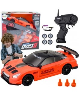Lean Toys -kaukosäädin R/C-urheiluauto 1:24 oranssit vaihdettavat pyörät