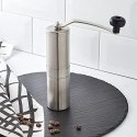 Porlex Tall manual coffee grinder made of stainless steel with ceramic grinder