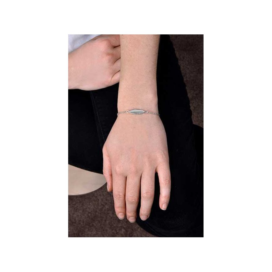 Stylish steel bracelet with a feather