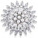 Golden sun brooch with stones and pearls Golden sun brooch with stones and pearls