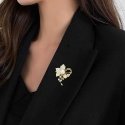 Shiny flower brooch with artificial pearls and silver Shiny flower brooch with artificial pearls and silver