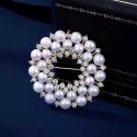 Charming pearl brooch with golden crystals Charming pearl brooch with golden crystals