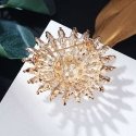 Shiny brooch with crystals and artificial pearls, gold Shiny brooch with crystals and artificial pearls, gold