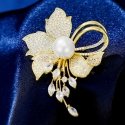 Shiny flower brooch with artificial pearl, gold Shiny flower brooch with artificial pearl, gold