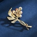 Elegant gold-plated brooch with artificial pearls 'Twig Gold' Elegant gold-plated brooch with artificial pearls 'Twig Gold'
