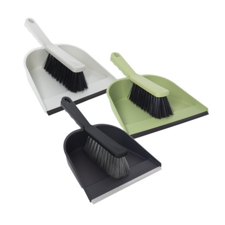 Dustpan with rubber edge and brush