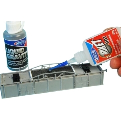 DELUXE MATERIALS Liquid Gravity balastus