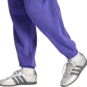 Женские брюки adidas Essentials Linear French Terry Cuffed фиолетового цвета KF8363 (L) Женские брюки adidas Essentials Linear French Terry Cuffed фиолетового цвета KF8363 (L)