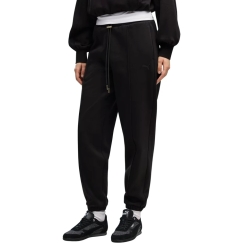 Puma Her Comfort Pants Fl mustat 694032 01 (S)