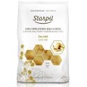 Low temperature melting wax for depilation Starpil, with gold particles, 1kg Low temperature melting wax for depilation Starpil, with gold particles, 1kg